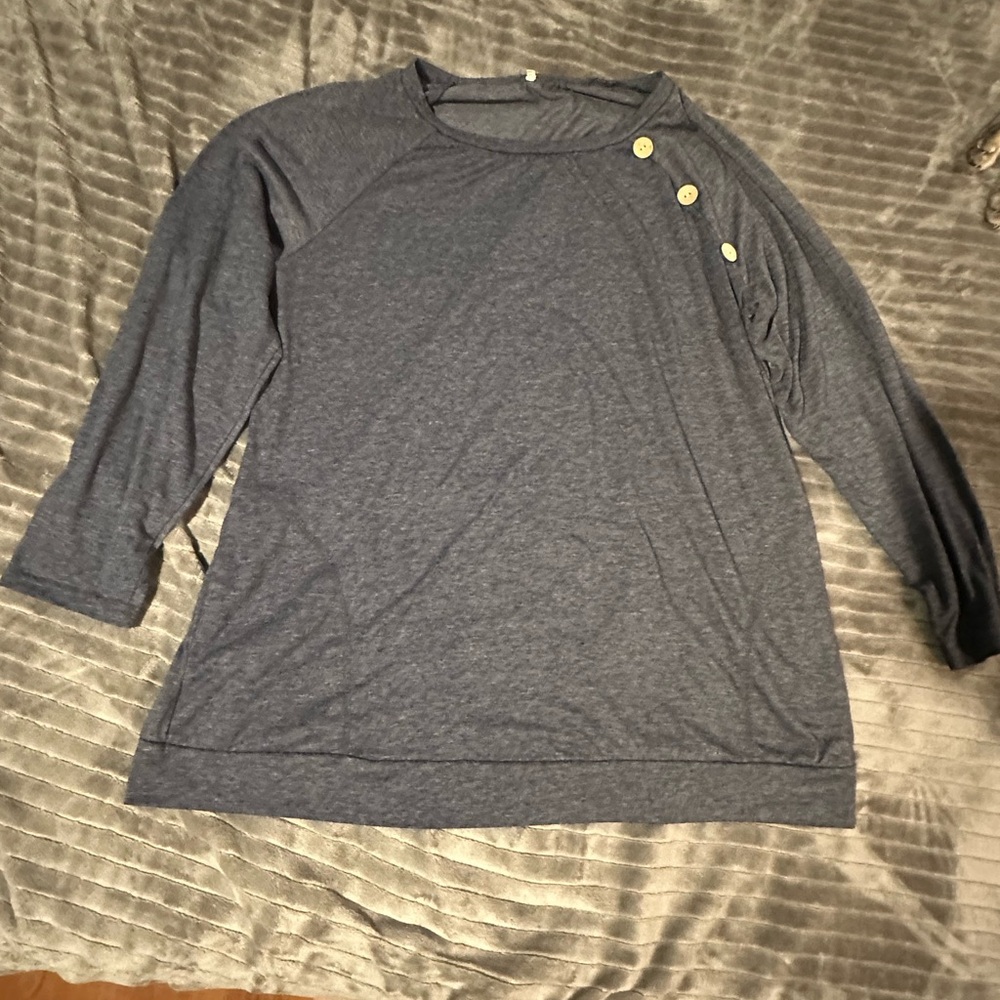 Cute and comfy tunic style long-sleeve with button detail!